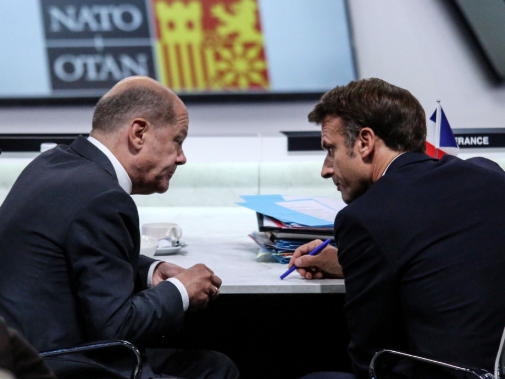 Scholz ne želi novi trgovinski rat sa SAD, Macron ima drugačije planove